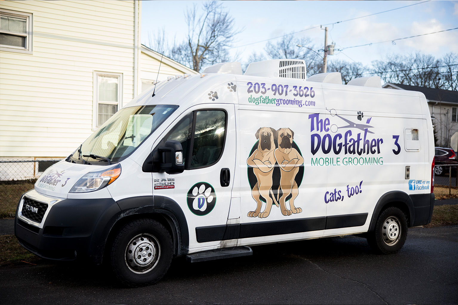 Dogfather Grooming mobile grooming van parked outside a home in Connecticut